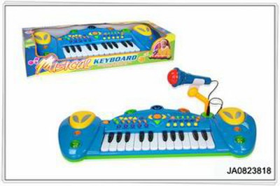 ELECTRONIC ORGAN W/MUSIC,